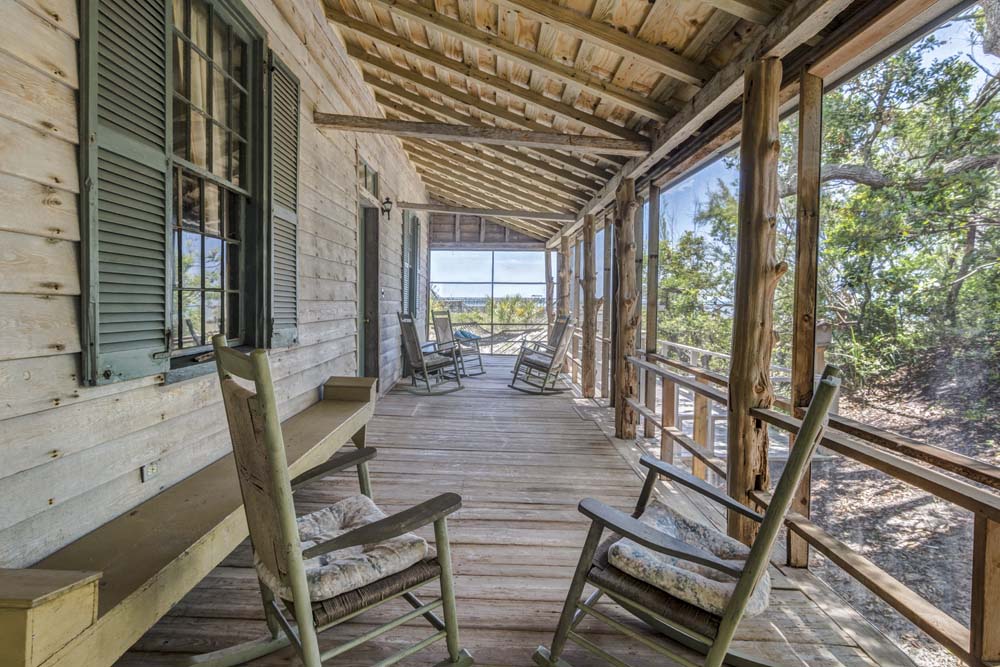 Rocking Chairs on Rustic Screen Porch By Screen Tight